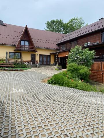 Gasthaus Domek Koniec Swiata Dzianisz Exterior foto